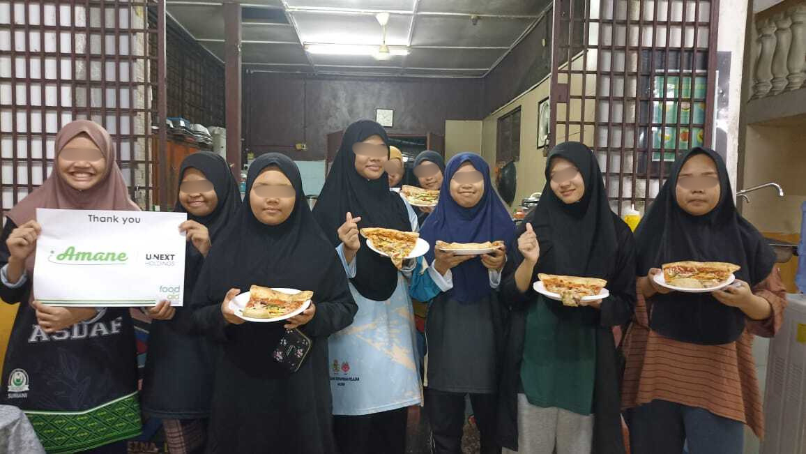 Donation of 555 Factory-Made Pizzas to Support Food Aid in Malaysia